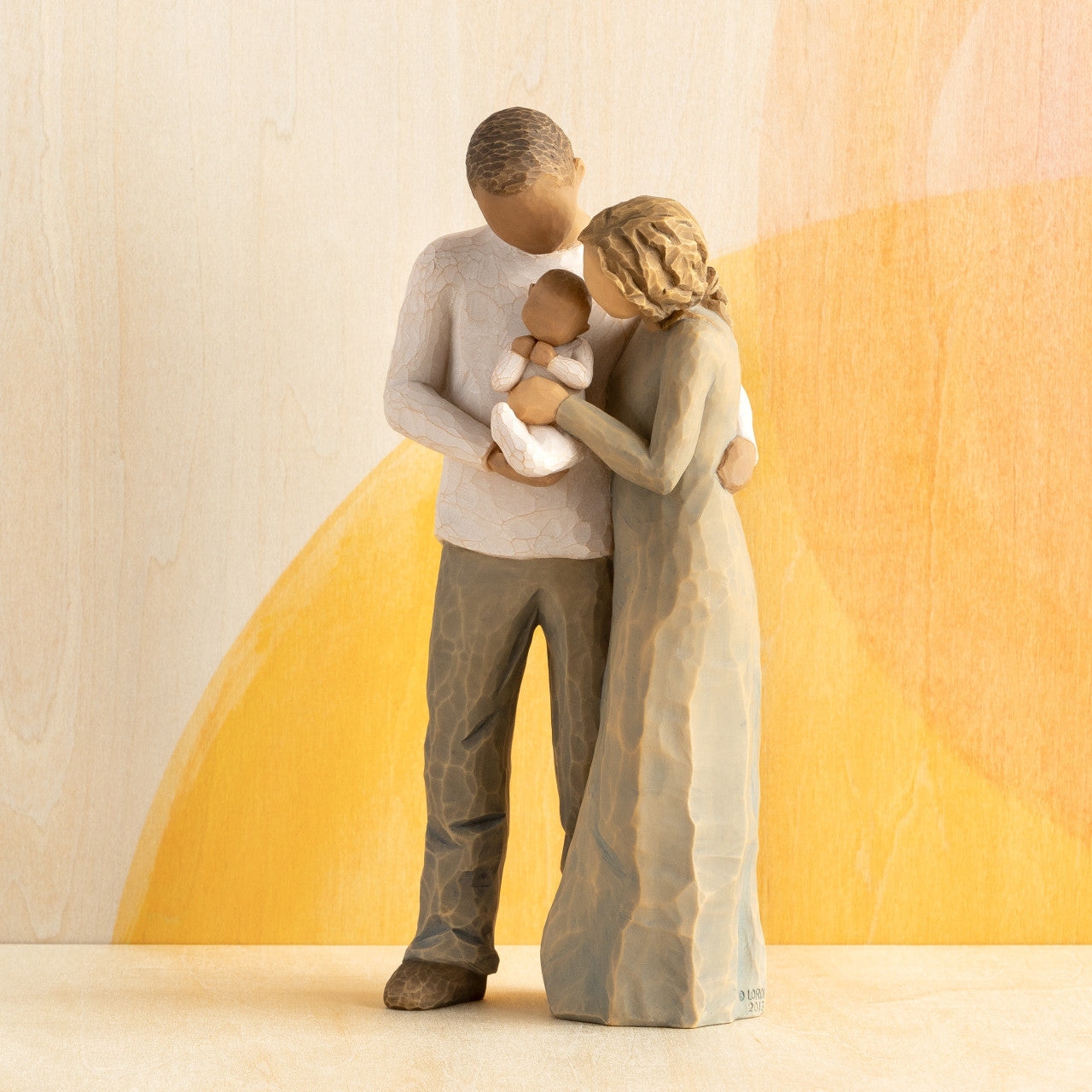 We are Three (woman: lighter skin, man: darker skin)