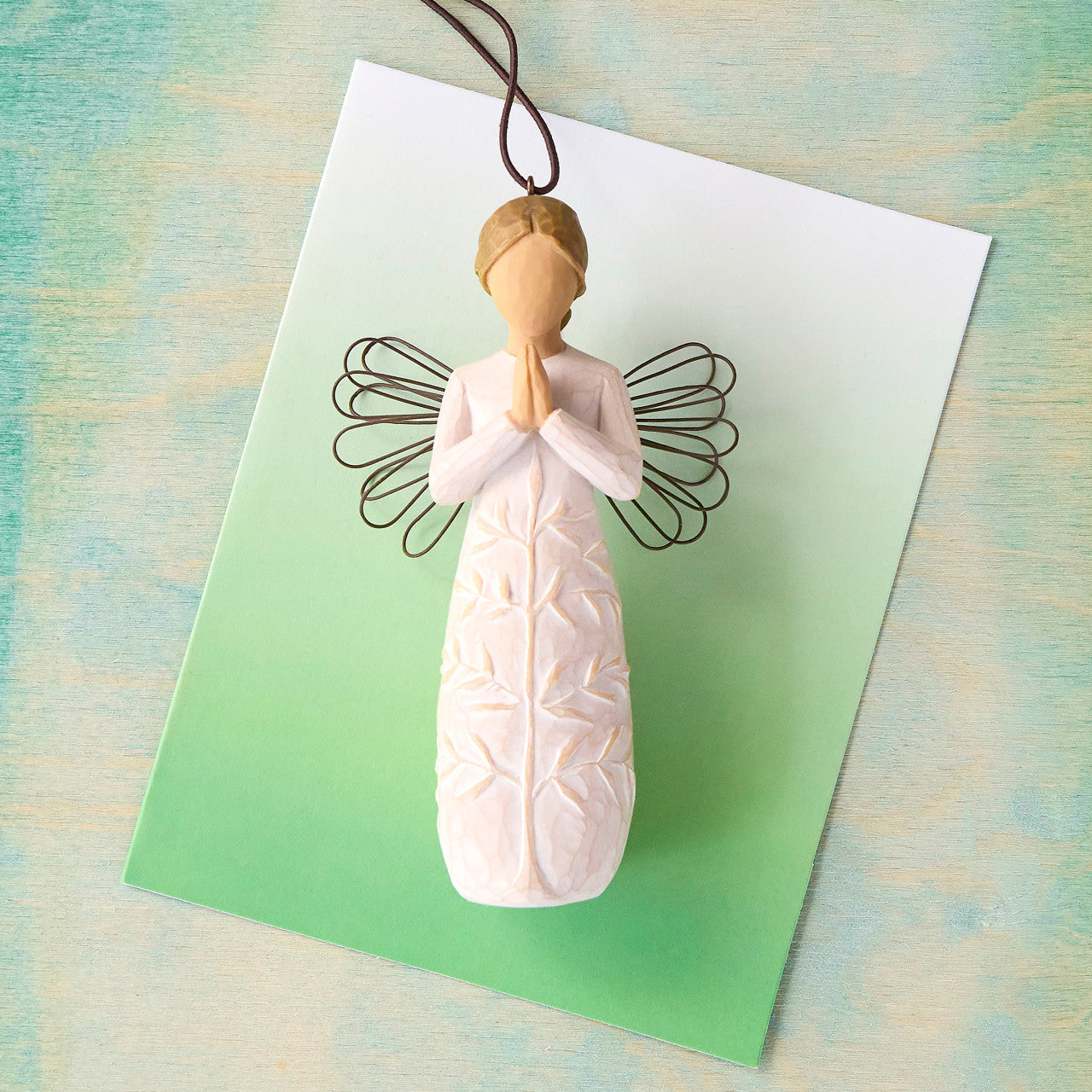 a tree, a prayer Ornament