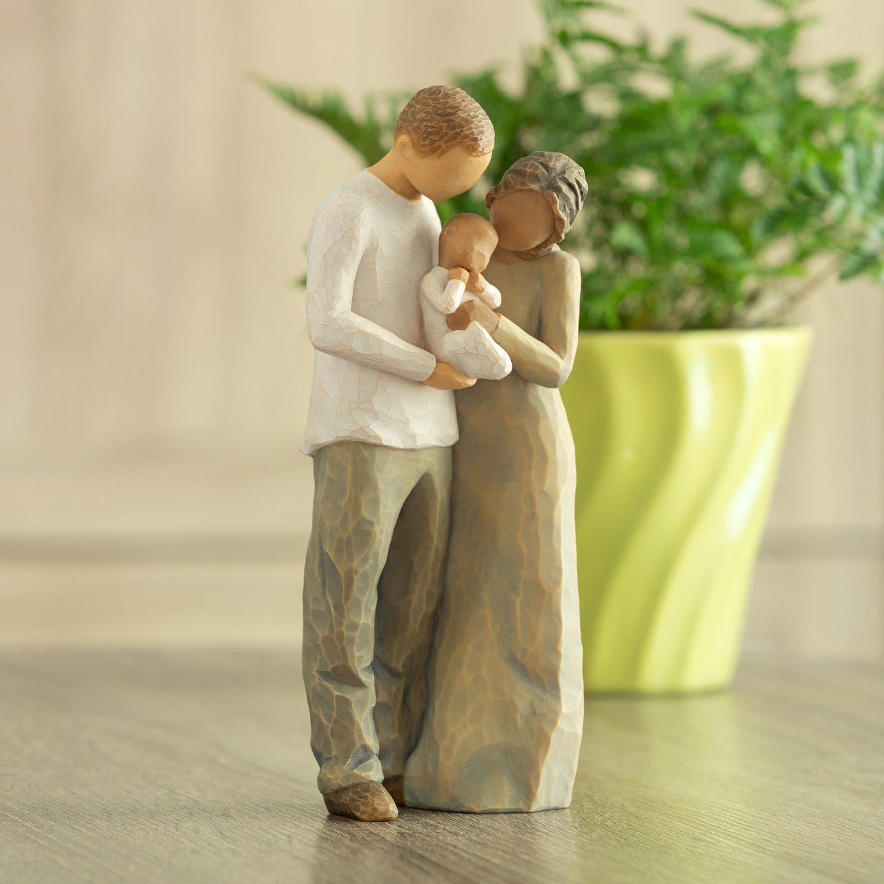 We are Three (woman: darker skin, man: lighter skin)