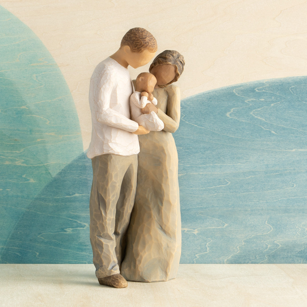 We are Three (woman: darker skin, man: lighter skin)