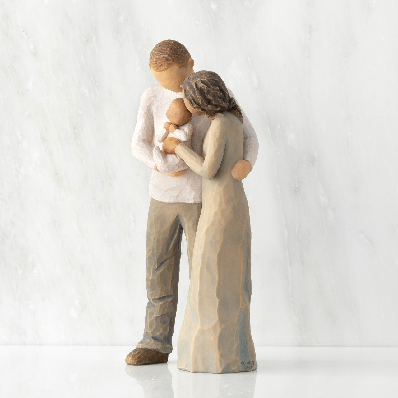 We are Three (woman: darker skin, man: lighter skin)