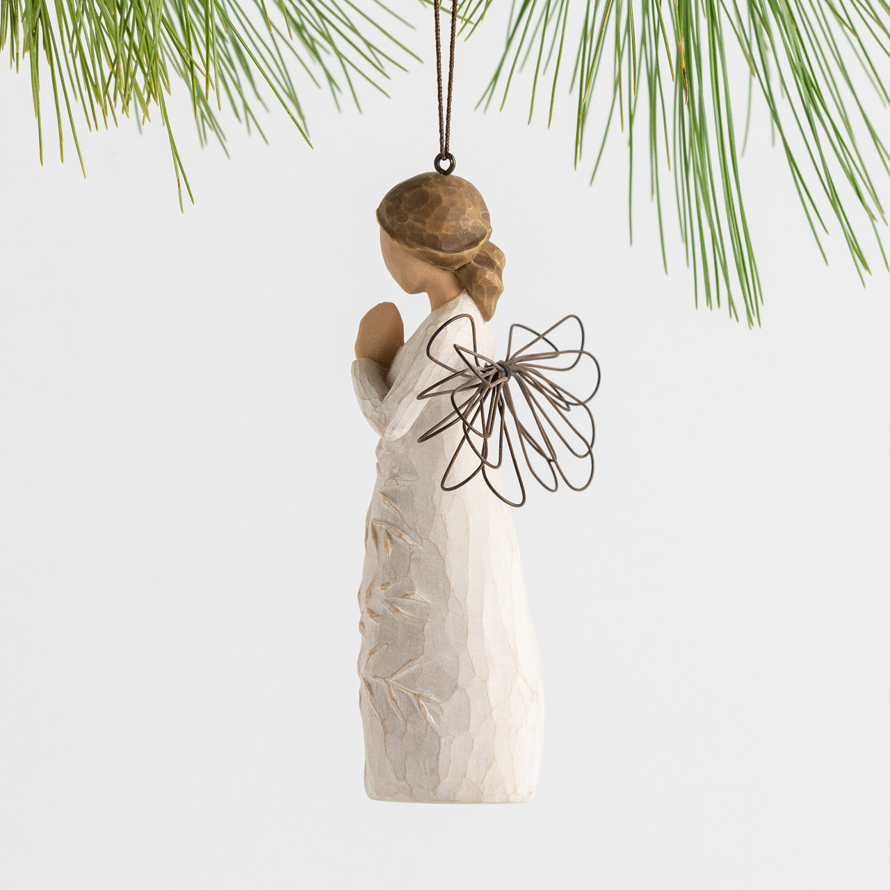a tree, a prayer Ornament